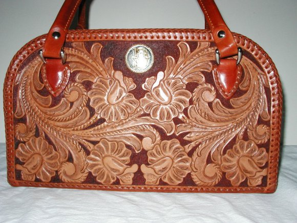 Floral carved  purse